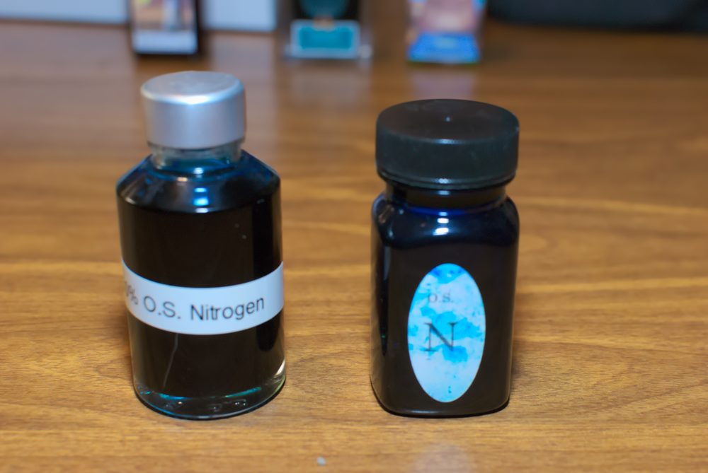 A bottle of Organics Studio&rsquo;s Nitrogen, next to a bottle of the same ink diluted by 50%